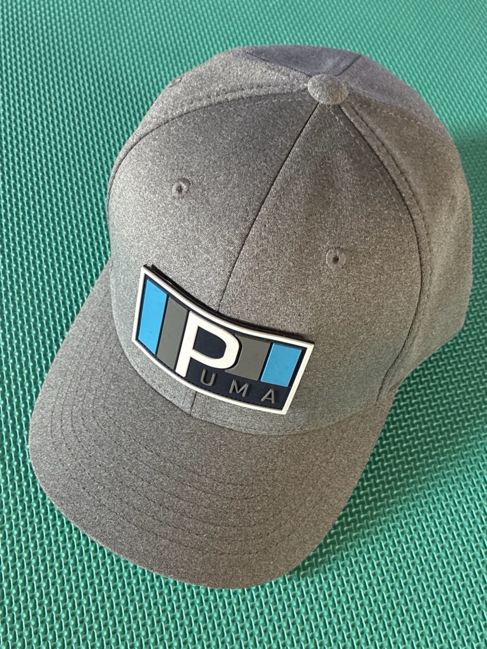 NWOT Puma Grey Cap with Blue Logo Patch